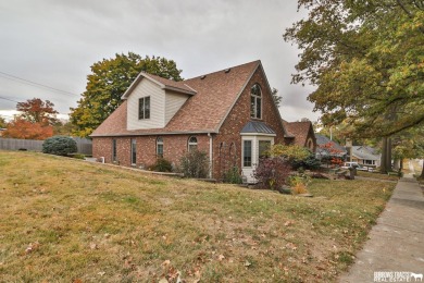 Experience the perfect blend of modern elegance and classic on Syracuse Golf Course in Nebraska - for sale on GolfHomes.com, golf home, golf lot