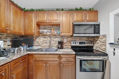 Beautifully updated 1-bedroom, 1-bath residence located in a on Sunrise Lakes Phase III in Florida - for sale on GolfHomes.com, golf home, golf lot