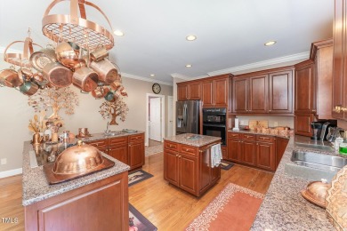 Welcome to a truly exceptional residence, nestled on over an on Governors Club in North Carolina - for sale on GolfHomes.com, golf home, golf lot