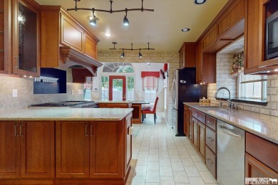 Experience the perfect blend of modern elegance and classic on Syracuse Golf Course in Nebraska - for sale on GolfHomes.com, golf home, golf lot