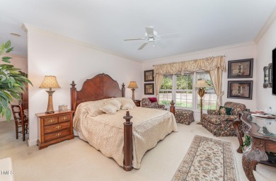 Welcome to a truly exceptional residence, nestled on over an on Governors Club in North Carolina - for sale on GolfHomes.com, golf home, golf lot