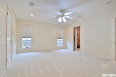 Experience the perfect blend of modern elegance and classic on Syracuse Golf Course in Nebraska - for sale on GolfHomes.com, golf home, golf lot