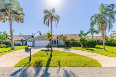 Discover your dream home in this highly sought-after on Eagle Ridge Golf and Tennis Club in Florida - for sale on GolfHomes.com, golf home, golf lot