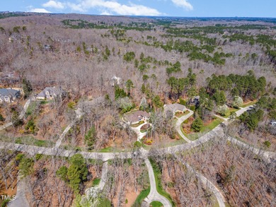 Welcome to a truly exceptional residence, nestled on over an on Governors Club in North Carolina - for sale on GolfHomes.com, golf home, golf lot