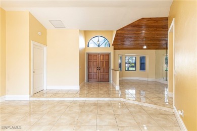 Discover your dream home in this highly sought-after on Eagle Ridge Golf and Tennis Club in Florida - for sale on GolfHomes.com, golf home, golf lot