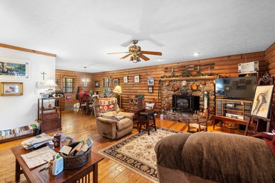 Charming 3-bedroom, 2-bath log home located in the heart of on Woodstone Meadows Golf Course At Massanutten in Virginia - for sale on GolfHomes.com, golf home, golf lot