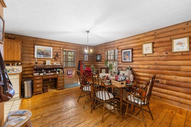 Charming 3-bedroom, 2-bath log home located in the heart of on Woodstone Meadows Golf Course At Massanutten in Virginia - for sale on GolfHomes.com, golf home, golf lot
