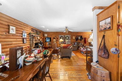 Charming 3-bedroom, 2-bath log home located in the heart of on Woodstone Meadows Golf Course At Massanutten in Virginia - for sale on GolfHomes.com, golf home, golf lot