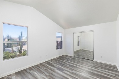 Welcome to this beautifully updated single-family home located on Menifee Lakes Country Club - Lakes in California - for sale on GolfHomes.com, golf home, golf lot
