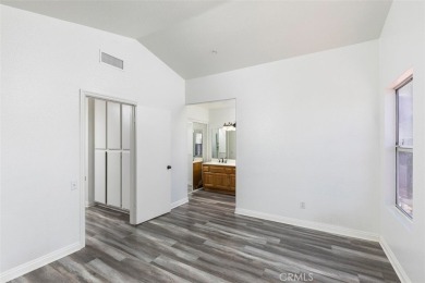 Welcome to this beautifully updated single-family home located on Menifee Lakes Country Club - Lakes in California - for sale on GolfHomes.com, golf home, golf lot