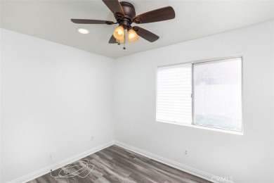 Welcome to this beautifully updated single-family home located on Menifee Lakes Country Club - Lakes in California - for sale on GolfHomes.com, golf home, golf lot