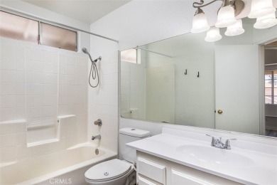 Welcome to this beautifully updated single-family home located on Menifee Lakes Country Club - Lakes in California - for sale on GolfHomes.com, golf home, golf lot