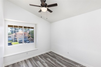Welcome to this beautifully updated single-family home located on Menifee Lakes Country Club - Lakes in California - for sale on GolfHomes.com, golf home, golf lot