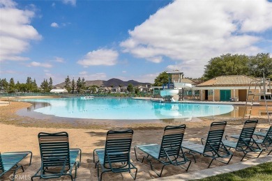 Welcome to this beautifully updated single-family home located on Menifee Lakes Country Club - Lakes in California - for sale on GolfHomes.com, golf home, golf lot