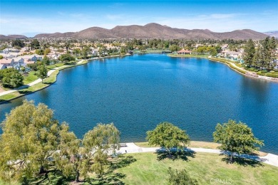 Welcome to this beautifully updated single-family home located on Menifee Lakes Country Club - Lakes in California - for sale on GolfHomes.com, golf home, golf lot