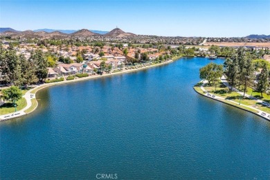 Welcome to this beautifully updated single-family home located on Menifee Lakes Country Club - Lakes in California - for sale on GolfHomes.com, golf home, golf lot
