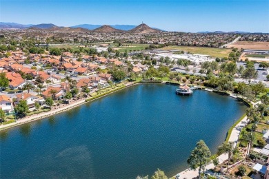 Welcome to this beautifully updated single-family home located on Menifee Lakes Country Club - Lakes in California - for sale on GolfHomes.com, golf home, golf lot