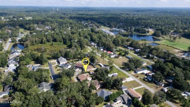 BIG PRICE IMPROVEMENT!! Nestled in the Oak Harbour community on Brick Landing Plantation Yacht and Golf Club in North Carolina - for sale on GolfHomes.com, golf home, golf lot