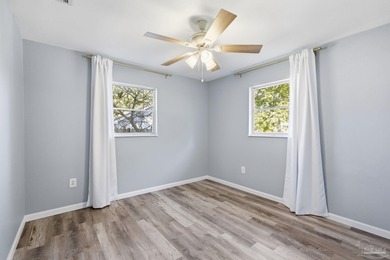 Welcome to your next home in beautiful Gulf Breeze, Florida! on Tiger Point Golf and Country Club in Florida - for sale on GolfHomes.com, golf home, golf lot