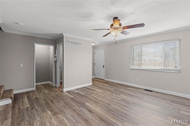 Live the lake life! This nicely updated 3 bedroom, 2.5 bathroom on Lake Saint Louis Par 3 in Missouri - for sale on GolfHomes.com, golf home, golf lot