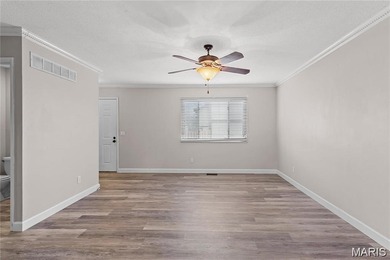 Live the lake life! This nicely updated 3 bedroom, 2.5 bathroom on Lake Saint Louis Par 3 in Missouri - for sale on GolfHomes.com, golf home, golf lot