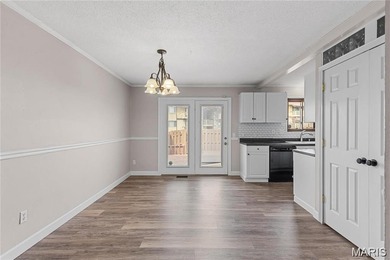 Live the lake life! This nicely updated 3 bedroom, 2.5 bathroom on Lake Saint Louis Par 3 in Missouri - for sale on GolfHomes.com, golf home, golf lot