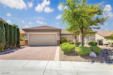 Immaculate Lincoln model with paver driveway, large courtyard on Revere Golf Club in Nevada - for sale on GolfHomes.com, golf home, golf lot
