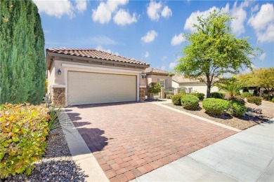 Immaculate Lincoln model with paver driveway, large courtyard on Revere Golf Club in Nevada - for sale on GolfHomes.com, golf home, golf lot
