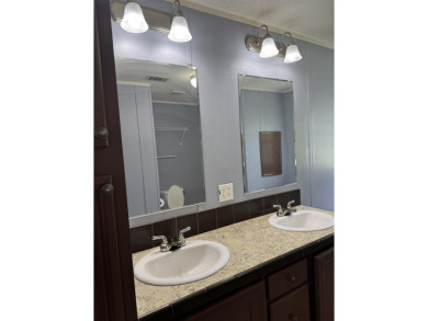 Recently moved to this lot, this beautifully 2015 manufactured on Wildwood Country Club in Florida - for sale on GolfHomes.com, golf home, golf lot