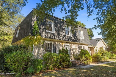 Charming house near 1st Tee of Rock Creek Golf Course. This 2 on Rock Creek Country Club in North Carolina - for sale on GolfHomes.com, golf home, golf lot