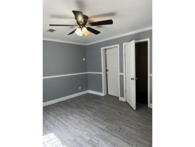 Recently moved to this lot, this beautifully 2015 manufactured on Wildwood Country Club in Florida - for sale on GolfHomes.com, golf home, golf lot