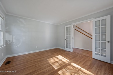 Charming house near 1st Tee of Rock Creek Golf Course. This 2 on Rock Creek Country Club in North Carolina - for sale on GolfHomes.com, golf home, golf lot