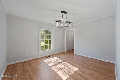 Looking for a house on a golf course near 1st Tee, nestled on a on Rock Creek Country Club in North Carolina - for sale on GolfHomes.com, golf home, golf lot