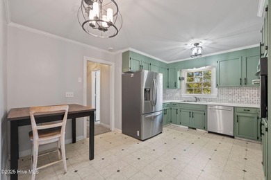 Charming house near 1st Tee of Rock Creek Golf Course. This 2 on Rock Creek Country Club in North Carolina - for sale on GolfHomes.com, golf home, golf lot