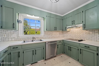 Charming house near 1st Tee of Rock Creek Golf Course. This 2 on Rock Creek Country Club in North Carolina - for sale on GolfHomes.com, golf home, golf lot