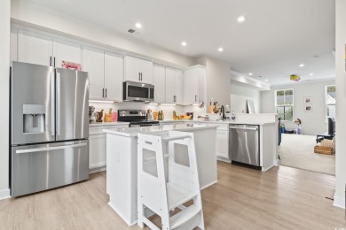 Modern Coastal Living! This elegant three-story townhome in the on Arrowhead Country Club in South Carolina - for sale on GolfHomes.com, golf home, golf lot