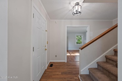 Charming house near 1st Tee of Rock Creek Golf Course. This 2 on Rock Creek Country Club in North Carolina - for sale on GolfHomes.com, golf home, golf lot