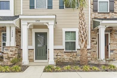 Modern Coastal Living! This elegant three-story townhome in the on Arrowhead Country Club in South Carolina - for sale on GolfHomes.com, golf home, golf lot