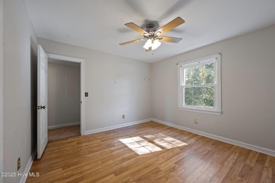 Charming house near 1st Tee of Rock Creek Golf Course. This 2 on Rock Creek Country Club in North Carolina - for sale on GolfHomes.com, golf home, golf lot