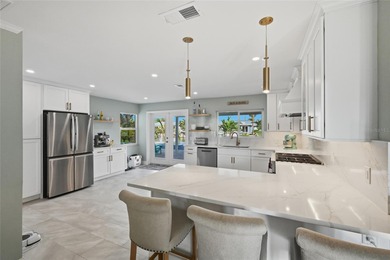 Welcome to your beautifully renovated coastal retreat on Anna on Key Royale Club in Florida - for sale on GolfHomes.com, golf home, golf lot