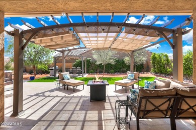 This 4-bedroom retreat, built in 2021, with a 3-car garage on a on Estrella Mountain Ranch Golf Course in Arizona - for sale on GolfHomes.com, golf home, golf lot