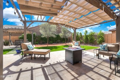 This 4-bedroom retreat, built in 2021, with a 3-car garage on a on Estrella Mountain Ranch Golf Course in Arizona - for sale on GolfHomes.com, golf home, golf lot