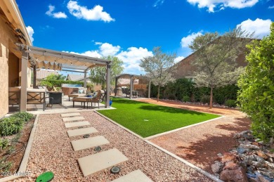 This 4-bedroom retreat, built in 2021, with a 3-car garage on a on Estrella Mountain Ranch Golf Course in Arizona - for sale on GolfHomes.com, golf home, golf lot