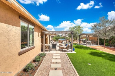 This 4-bedroom retreat, built in 2021, with a 3-car garage on a on Estrella Mountain Ranch Golf Course in Arizona - for sale on GolfHomes.com, golf home, golf lot