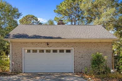 Charming house near 1st Tee of Rock Creek Golf Course. This 2 on Rock Creek Country Club in North Carolina - for sale on GolfHomes.com, golf home, golf lot