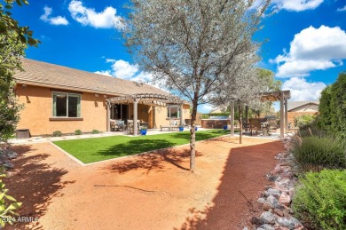 This 4-bedroom retreat, built in 2021, with a 3-car garage on a on Estrella Mountain Ranch Golf Course in Arizona - for sale on GolfHomes.com, golf home, golf lot