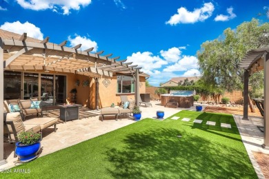 This 4-bedroom retreat, built in 2021, with a 3-car garage on a on Estrella Mountain Ranch Golf Course in Arizona - for sale on GolfHomes.com, golf home, golf lot