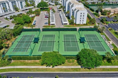Upgraded top floor unit with ocean, golf course & pond views on Ocean Village Golf Course in Florida - for sale on GolfHomes.com, golf home, golf lot