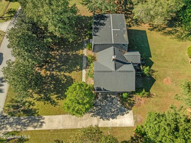 Charming house near 1st Tee of Rock Creek Golf Course. This 2 on Rock Creek Country Club in North Carolina - for sale on GolfHomes.com, golf home, golf lot