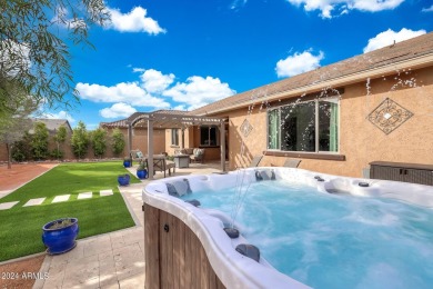 This 4-bedroom retreat, built in 2021, with a 3-car garage on a on Estrella Mountain Ranch Golf Course in Arizona - for sale on GolfHomes.com, golf home, golf lot